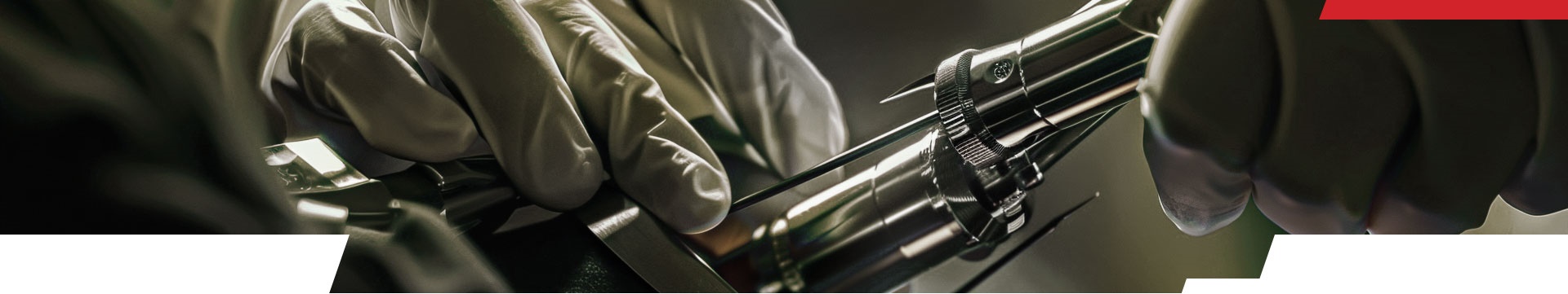 Latex gloved hands assembling complex tool